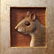 Grey Squirrel (Sciurus carolinensis) Gold leaf and oil colour on wood H.21.5 x 20 x 5cms