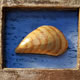 Zebra Mussel  (Dreissena polymorpha) Gold leaf and oil colour on wood H.12 x 14 x 4.5cms