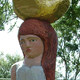 Woman and Boulder, 2011 Oil colour and gold leaf on elm Height 260 cm
