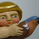 Detail - Cherub with a Chaffinch Limewood 2013 Length 70cm